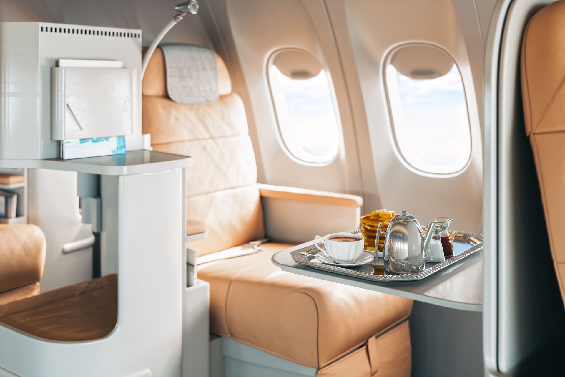 First Class Airplane Seat With Tray Of Food